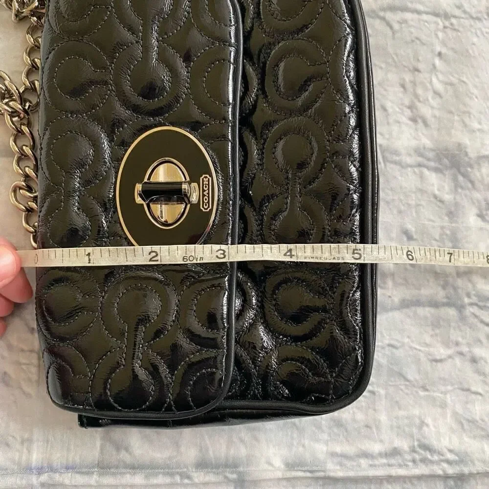 Coach mini shoulder/crossbody bag w/twist latch closure w/satin inner lining